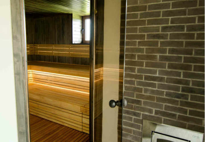 Sauna with Dark-Toned Interior and Window