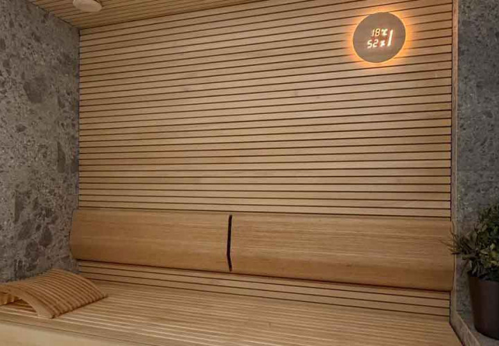 Sauna with wood and stone finish