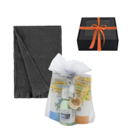 Men's gift set in a gift box. Sauna honey, sauna oil and hand towel