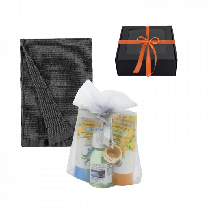 Men's gift set in a gift box. Sauna honey, sauna oil and hand towel