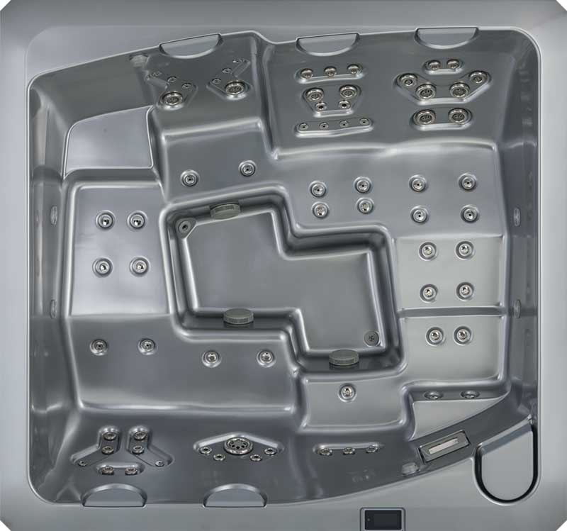 Top view of a grey USSPA spa pool with ergonomic seating and multiple jet zones