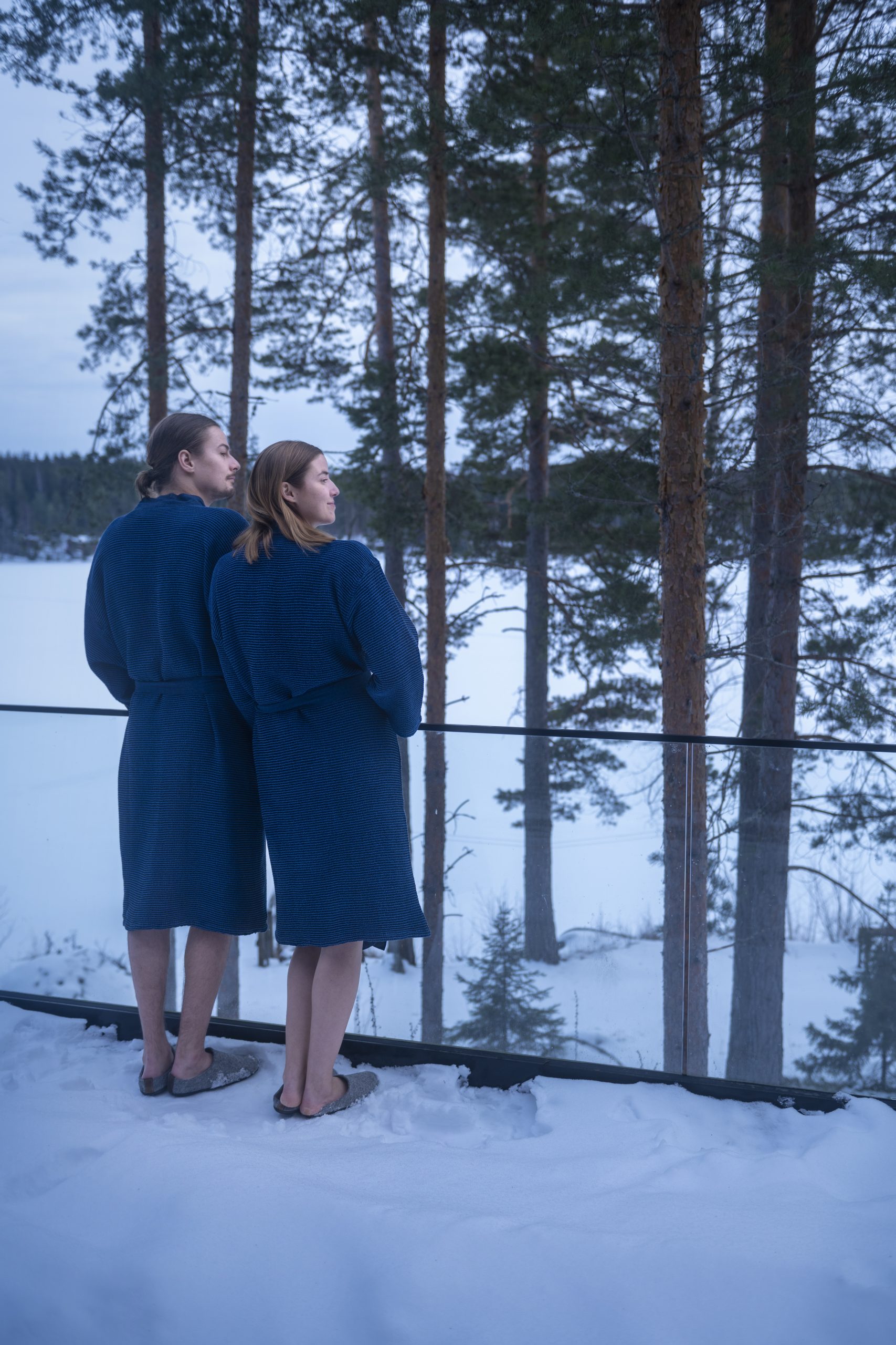Man and woman wearing robes