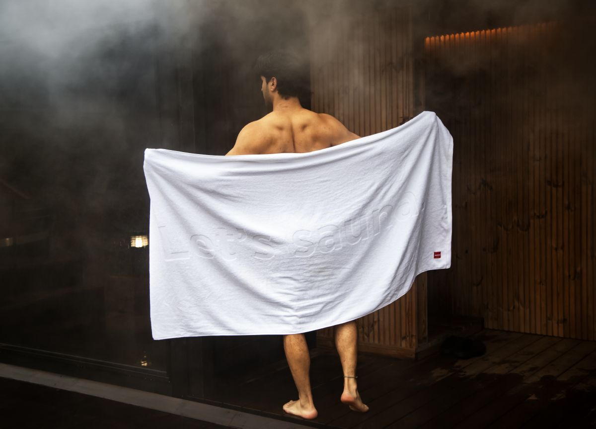 Man with a sauna towel