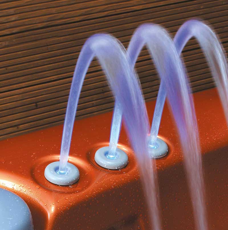 Three illuminated waterfall jets in a USSPA spa pool