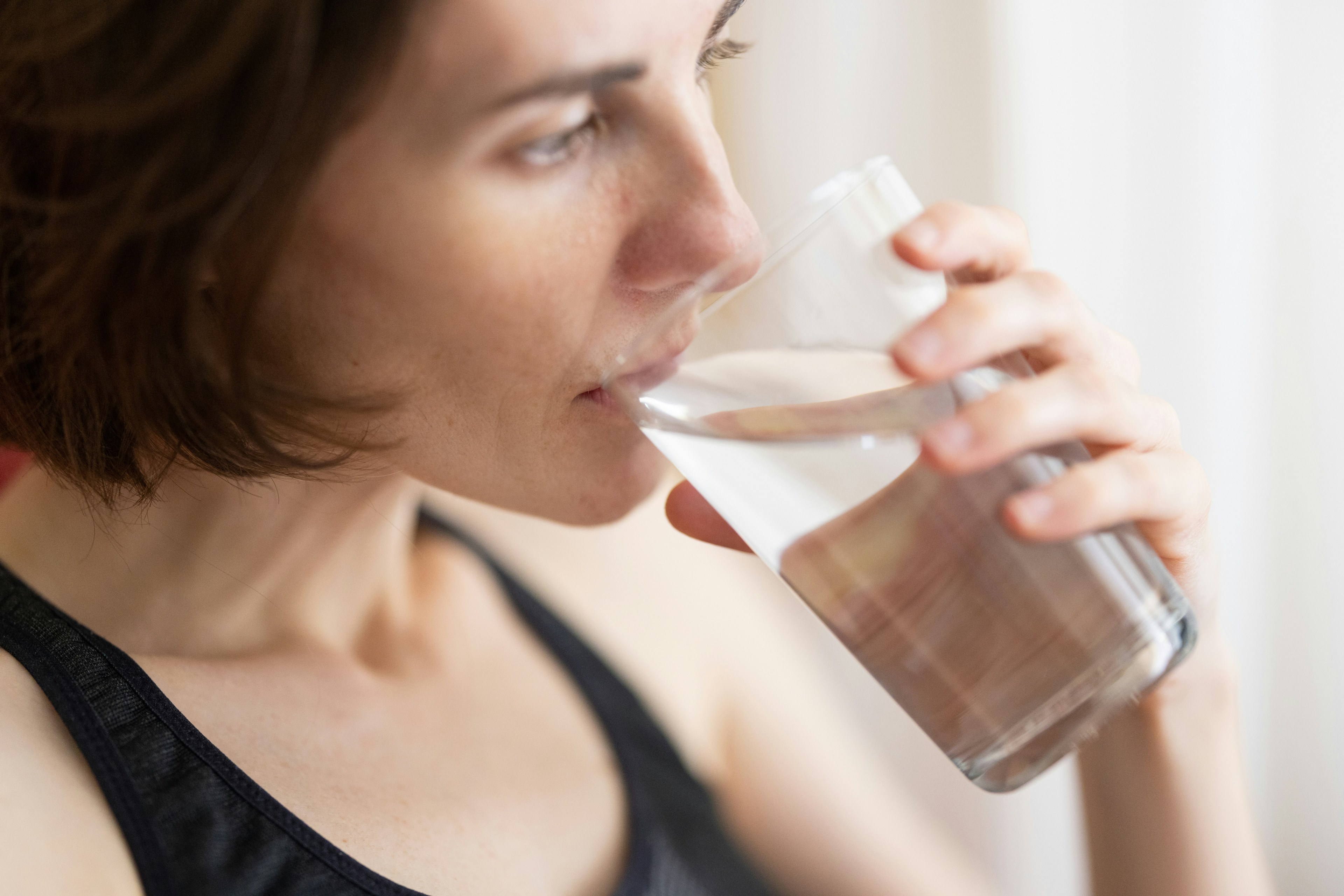 Girl drinking a glass of water